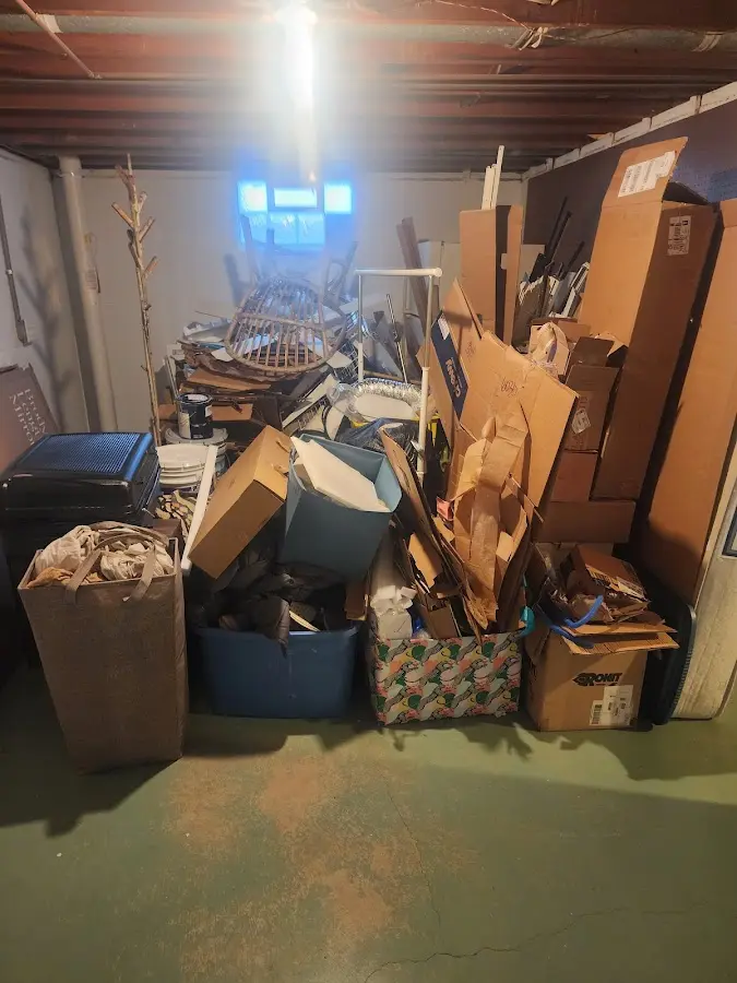 Roll-off dumpster container at job site for 2 Yard Dumpster Rental in Guilford